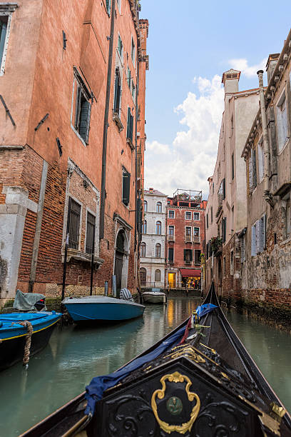 istock Gondola and modern ships in the narrow Venetian canals 505168996