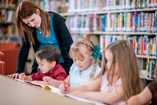 istock Coloring Pictures Together in the Library 505169974