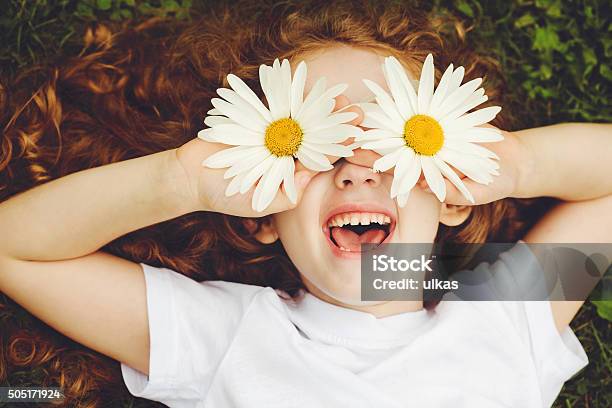 Child With Daisy Eyes Stock Photo - Download Image Now - Child, Springtime, Flower