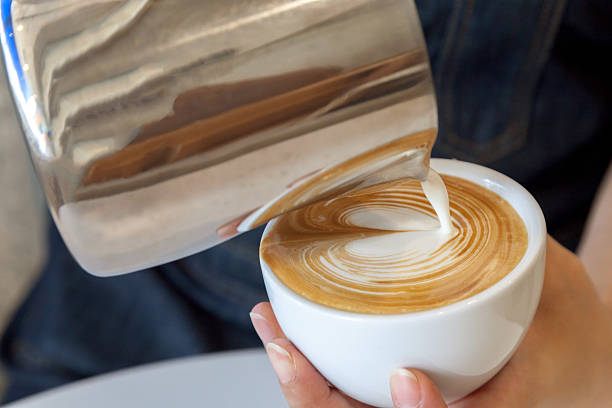 istock Pouring latte art into the cup 505172360