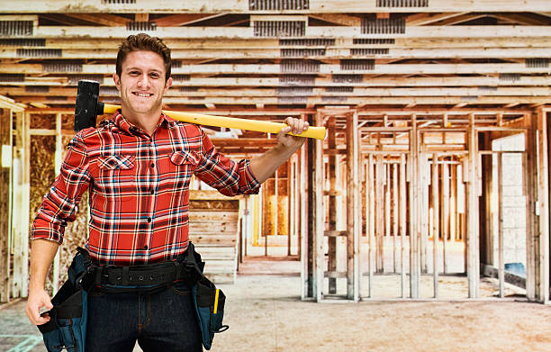 Smiling building contractor in construction site Smiling building contractor in construction sitehttp://www.twodozendesign.info/i/1.png 24 x 24 frame stock pictures, royalty-free photos & images