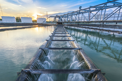 Planta de tratamiento de aguas en puesta de sol photo