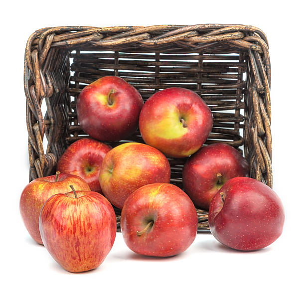 istock Apples on the background of an old basket 505193091