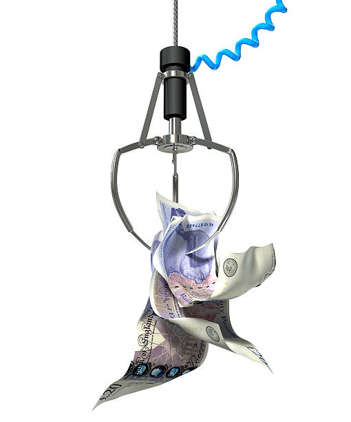 istock British Pound Sterling In A Robotic Claw 505196497