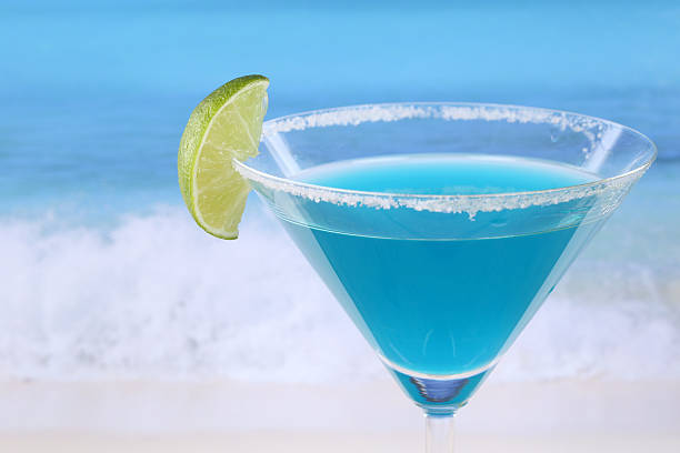 istock Blue Curacao cocktail on the beach with copyspace 505197915
