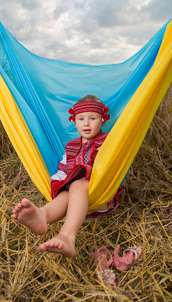 istock little girl in a wheat field 505199449