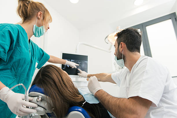 istock doctor and the assistant during a surgery - Stock image 505205704