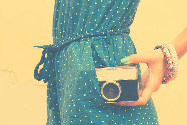istock Hipster girl with old camera. 505208164