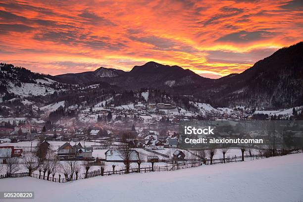 Winter Sunrise Above The Transylvanian Village Stock Photo - Download Image Now - Beauty, Beauty In Nature, Carpathian Mountain Range