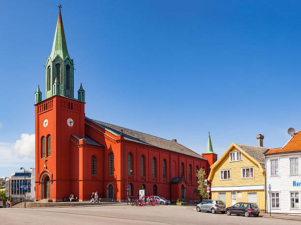 Domkirken in Stavanger city Stavanger, Norway - July 15, 2015: Beatiful St. Peter Church or St. Petri Kirke is red brick and was built in 1866 situated in the centre in Stavanger. stavanger cathedral stock pictures, royalty-free photos & images