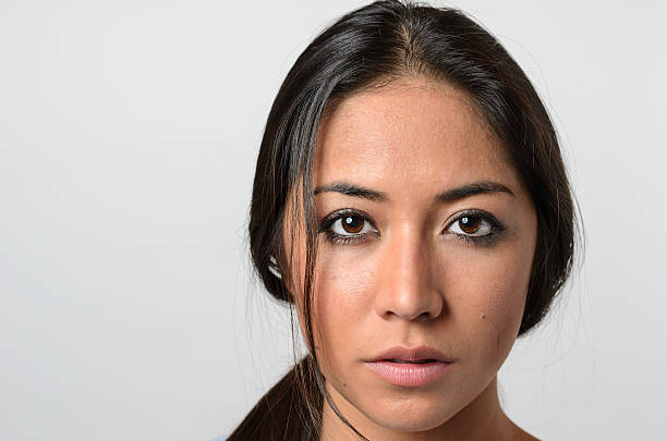 istock Woman with serious blank stare 505211052