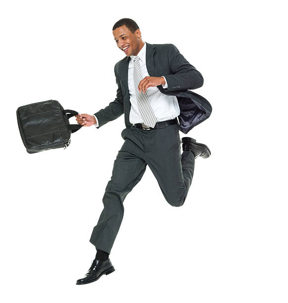 istock Smiling businessman jumping 505215438