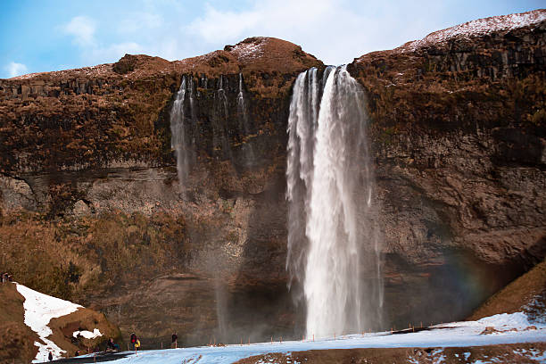 istock Tourists visit landmark Seljalandsfoss in Iceland 505216730