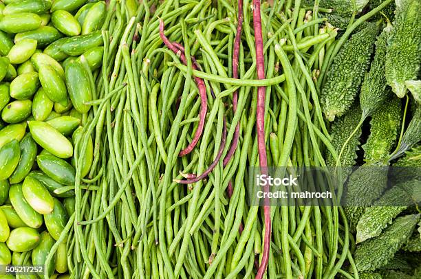 Bitter Melon Cucumbers And Longbeans At The Market Stock Photo - Download Image Now