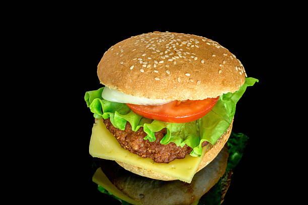 istock humburger with fresh vegetables with reflection isolated 505217342
