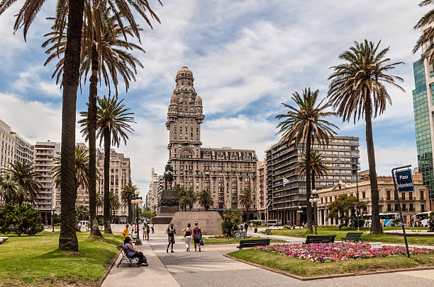 Montevideo Montevideo, Uruguay - December 15, 2012: Plaza indepedencia with the building Palacio Salvo and the statue of Jose Artigas in Montevideo, Uruguay. uruguay photos stock pictures, royalty-free photos & images