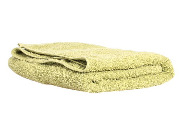 istock Green body towel isolated on white background 505221108