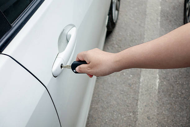 istock woman hand holding car keys 505221500