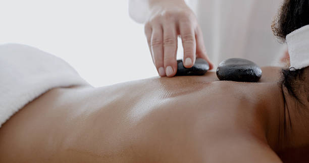 istock Woman Receiving A Massage With Hot Stone 505223406