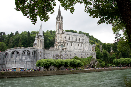 Pilgrims from all over the world, including many people with disabilities in the hope of a miraculous healing come to outdoor Mass at Shrine in Lourdes