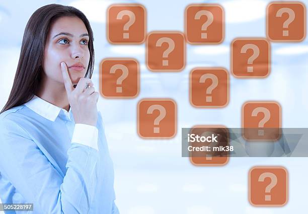 Woman And Query Signs Stock Photo - Download Image Now - Adult, Adversity, Asking