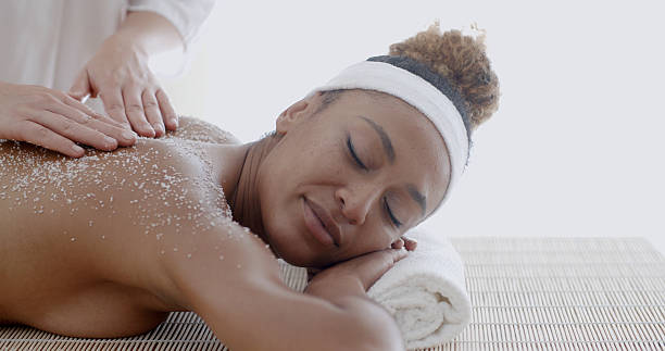 istock Female Getting A Salt Scrub Treatment 505229216