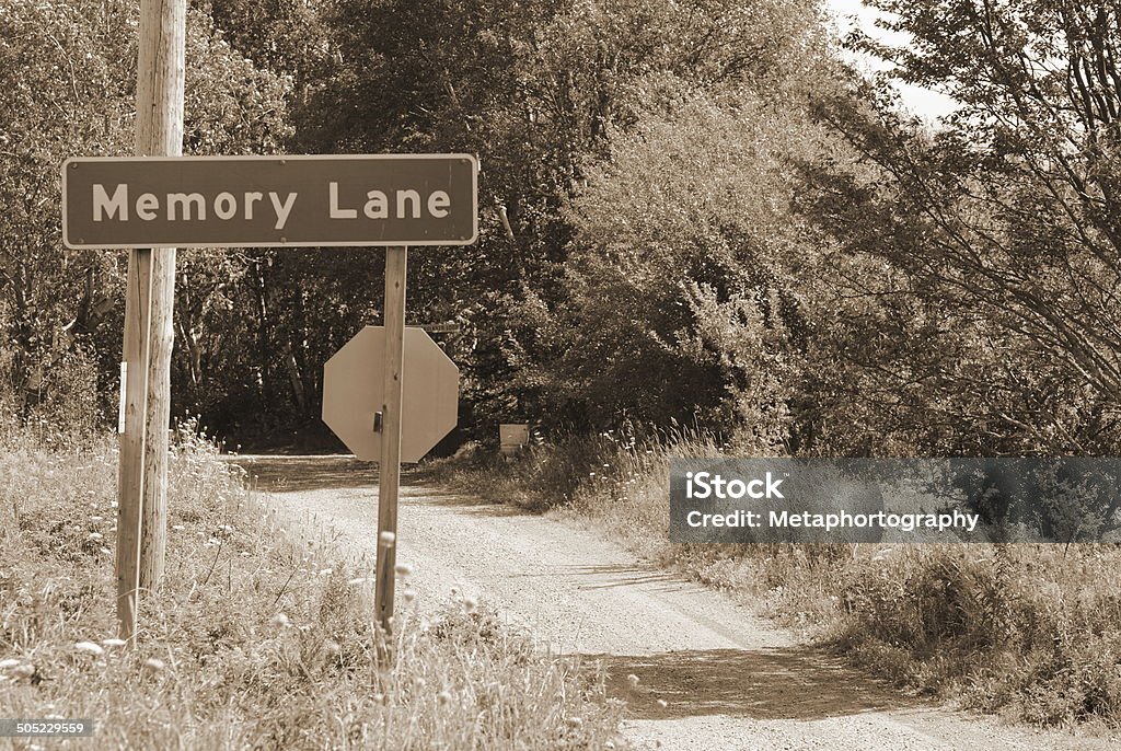 Memory Lane in Sepia Memory Lane street sign, rural road in sepia Nostalgia Stock Photo