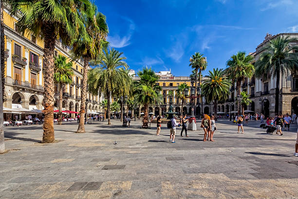 Barcelona, Spain - June 08 2018: The fountain of the Three Graces (Catalan: Font de les Tres Gràcies) is located in the Plaza Real de Barcelona, in the district of Ciutat Vella.