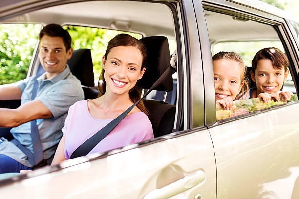 istock Happy Family Sitting In Car 505232703