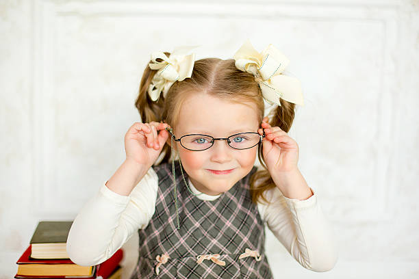 istock little the girl with books 505234026