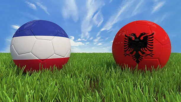 3D soccer balls with France and Albania flag, Euro 2016. Placed on 3d grass. Background isolated with clipping path.