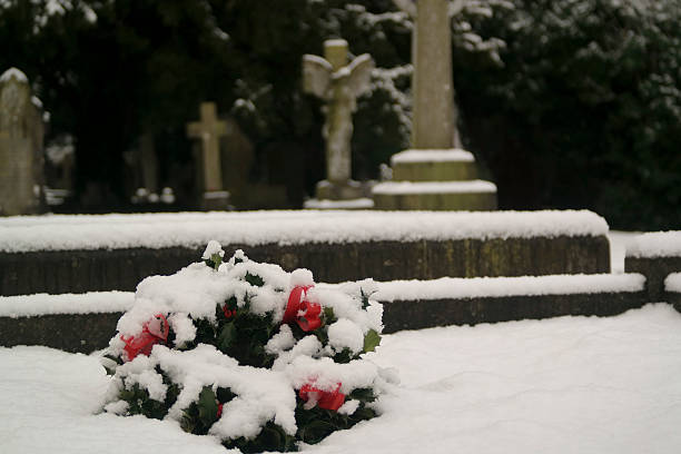 istock Winter snow pictures in a graveyard 505235814