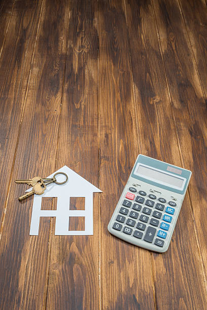 istock Mortgage Calculator, house and key with Calculator 505235956