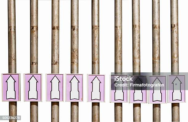 Tube In A Row Stock Photo - Download Image Now - Arrow Symbol, Business Finance and Industry, Crude Oil