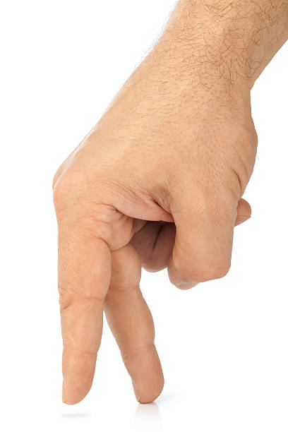 istock Small man made of fingers hand 505236518