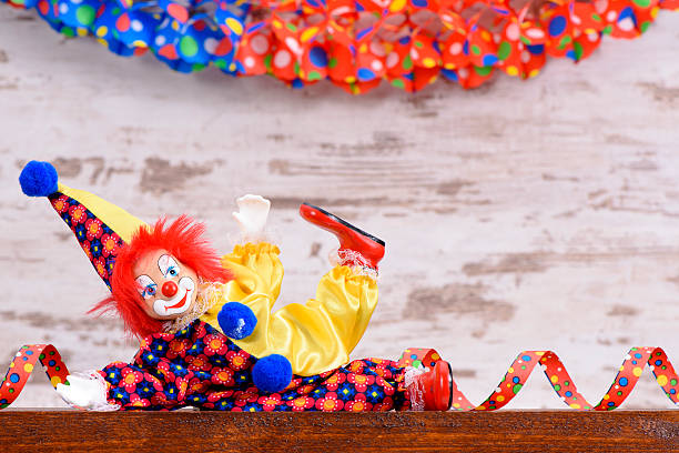 istock clown with paper streamer at carnival 505236816