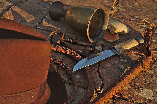 istock Fedora hat, bullwhip and relics 505238882