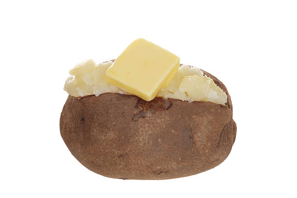 istock isolated baked potato with butter 505238950