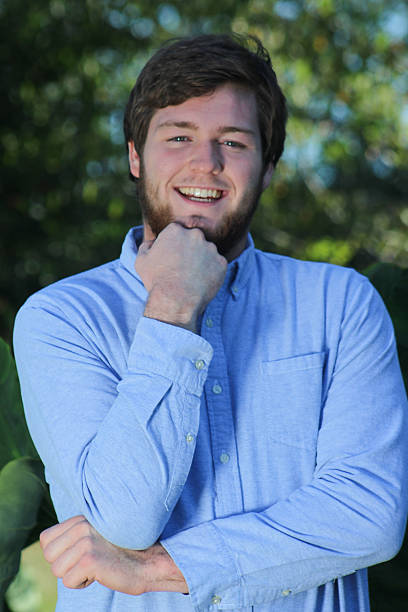 istock Smiling Teenager Poses For Camera 505239142