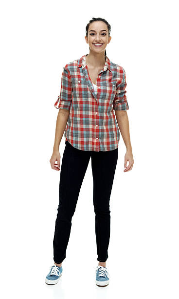istock Smiling female standing and looking at camera 505239824