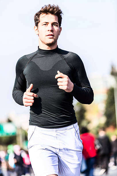 homem correndo na maratona - healthy lifestyle turkey sport marathon - fotografias e filmes do acervo