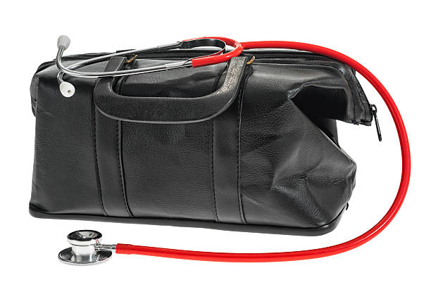 Doctor's bag  and stethoscope on a white background