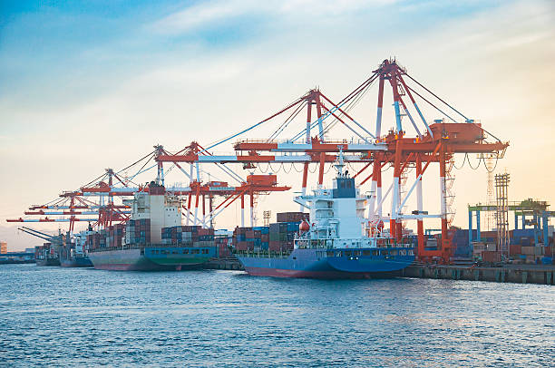 istock Industrial Container Cargo freight ship with working crane bridg 505245334