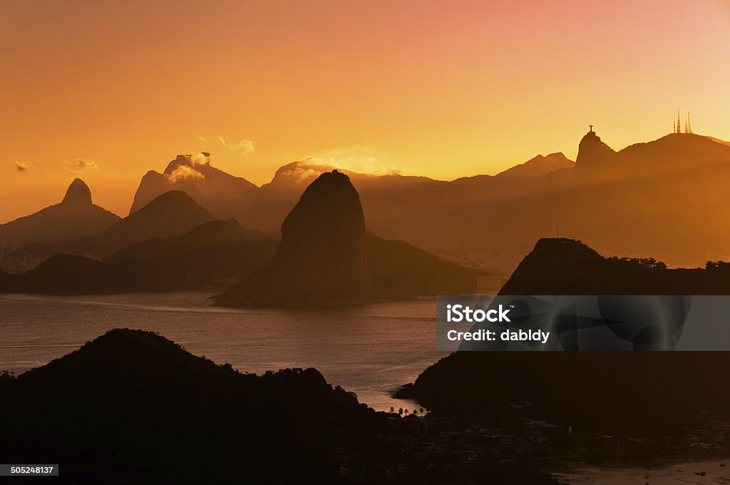 Scenic Rio de Janeiro Mountain View By Sunset Beautiful View of Rio de Janeiro Mountains by Sunset from the City Park in Niteroi. Aerial View Stock Photo