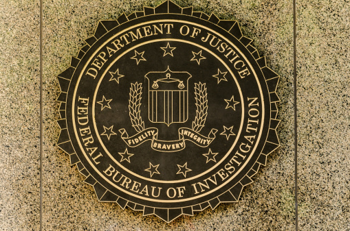 Washington, USA - April 24, 2011: FBI emblem on the J. Edgar Hoover F.B.I. Building in downtown Washington, DC