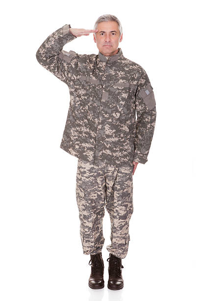Mature Military Soldier Saluting Isolated On White Background