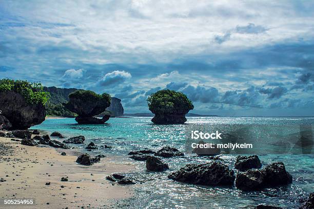 Large Rocks In Ocean Stock Photo - Download Image Now - Guam, Beach, Landscape - Scenery