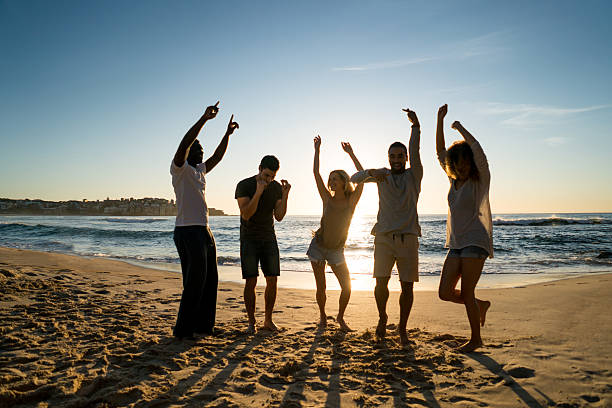 istock Group of friends having fun at the beach 505259642
