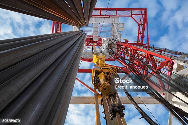 Oil Rig With Pipes From Bottom To Top View Stock Photo - Download Image Now - Drilling Rig, Offshore Platform, Drill