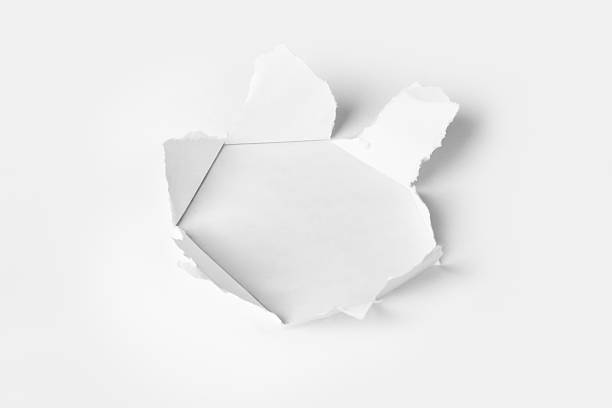 istock Hole punched in the paper 505261424